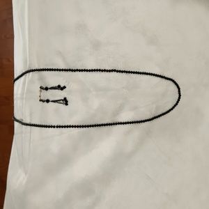 Black beaded necklace and drop black beaded post earrings..